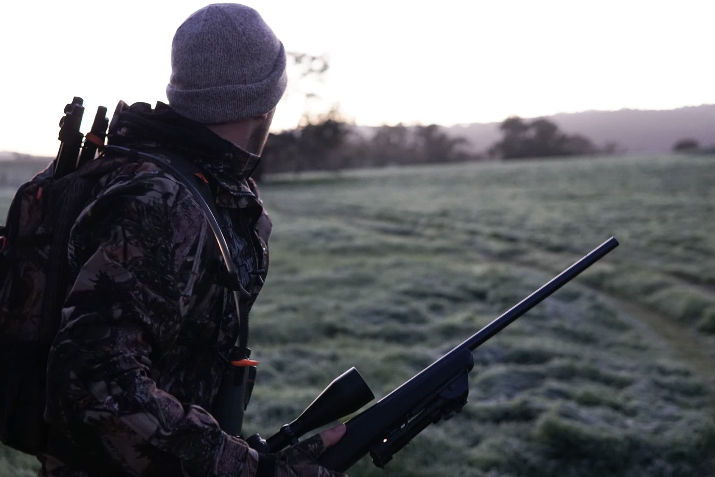 A hunter walking out at first light